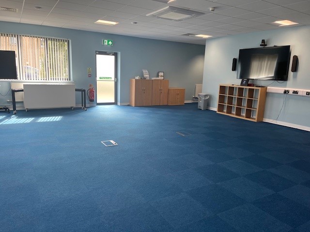 Community Room photo with no tables or chairs out